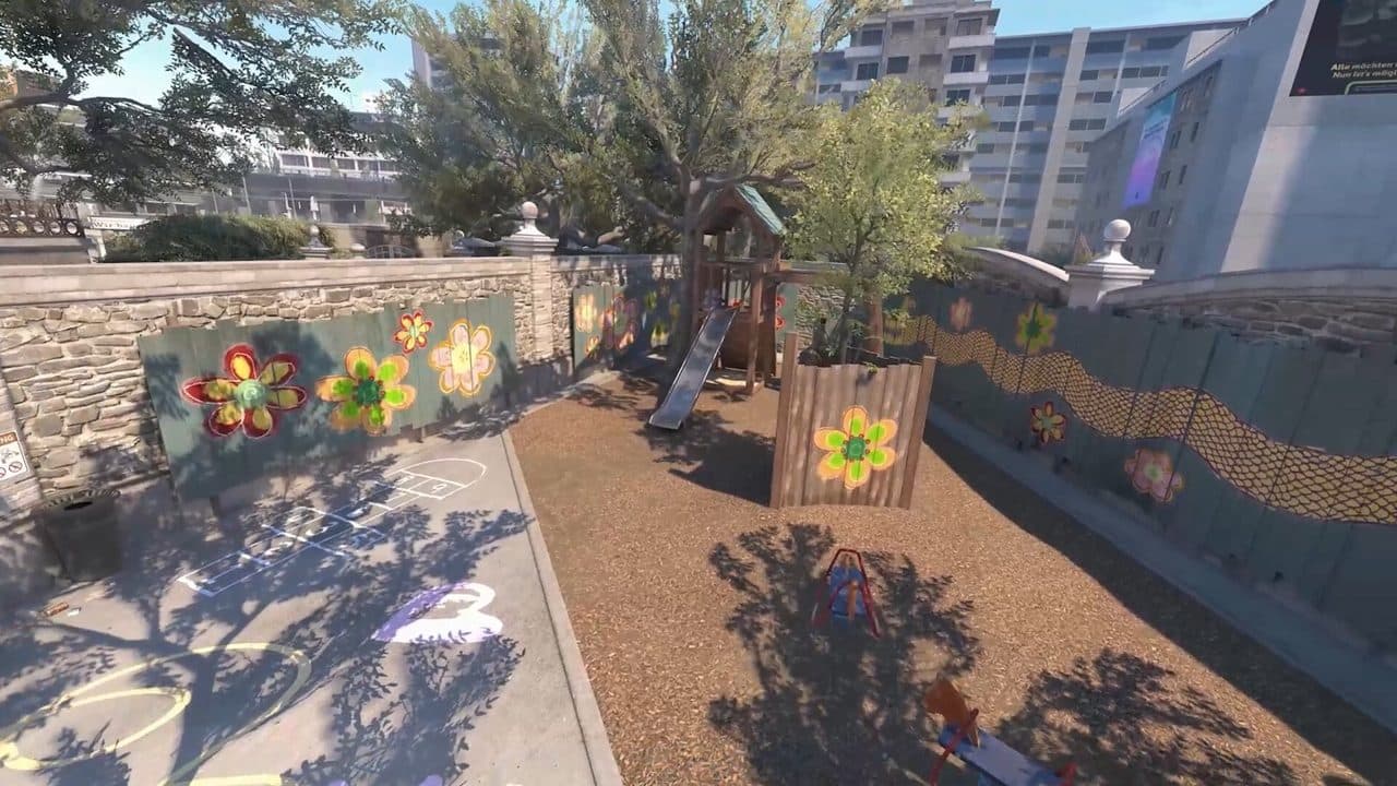 First-person CS2 view scoped on Dust2 long doors with the AWP crosshair centered on the angle and warm desert lighting